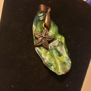 Handmade shell necklace painted with alcohol ink.